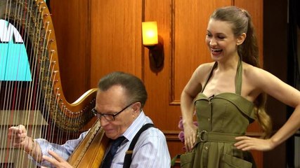 Watch Joanna Newsom Teach Larry King to Play the Harp!