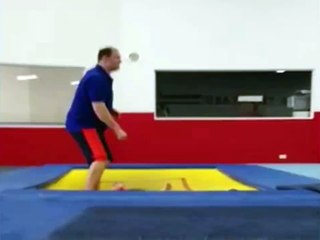 Man Catches His Son on Trampoline