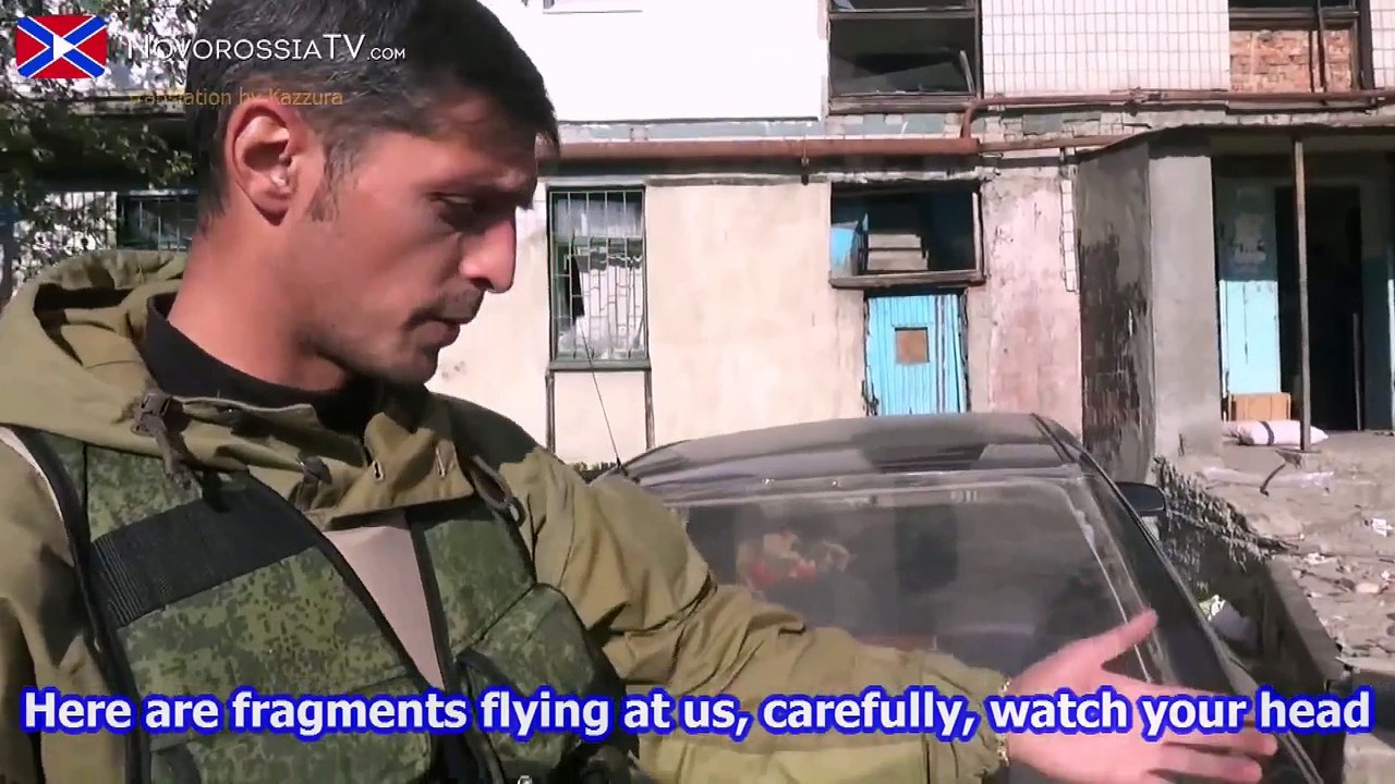 Russian Soldier gives no Fuck of explositions and firing near him during Interview