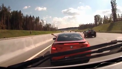 BMW M6 driver blocking an ambulance on highway