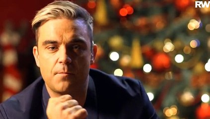 Oooosh can't believe we was in this video with robbie Williams