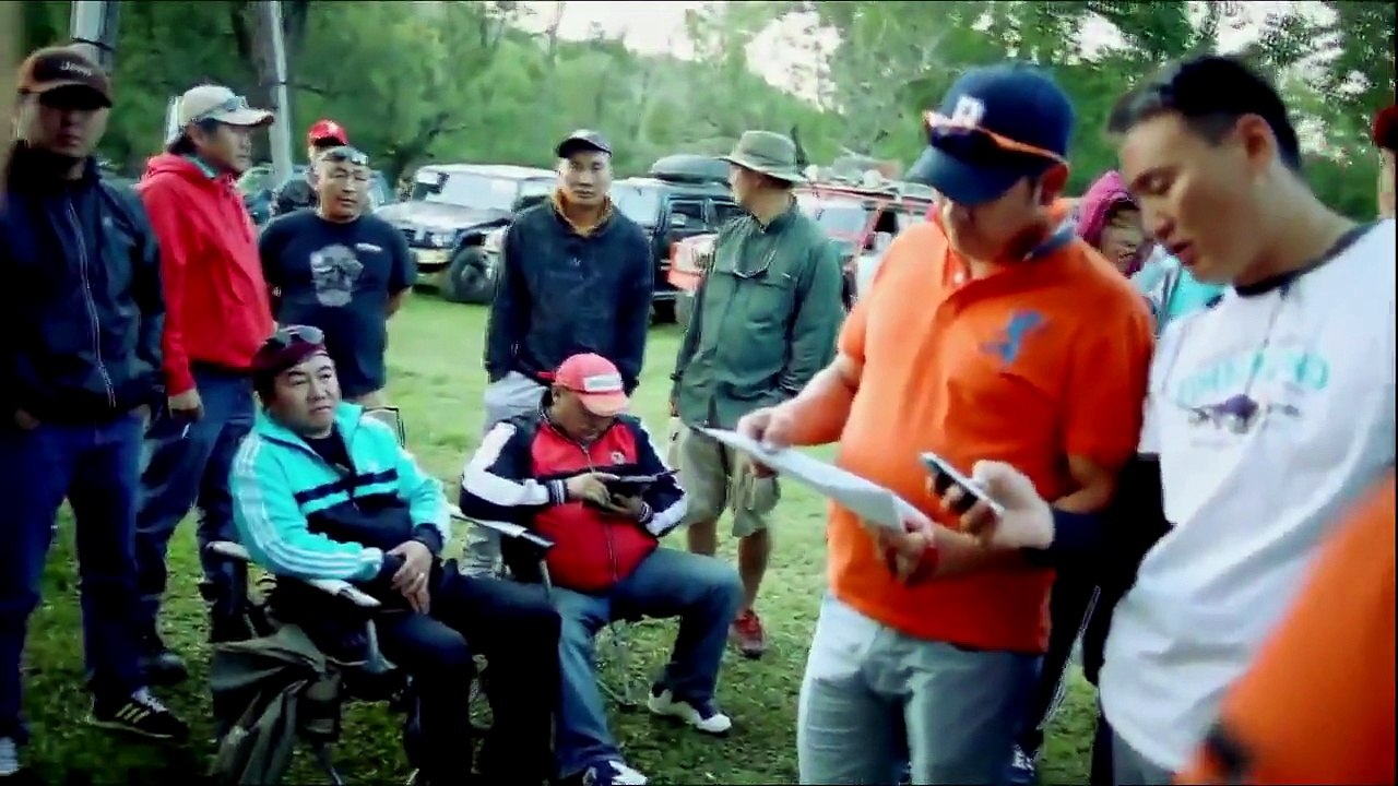 A Russian tractor driver refuses to give up after his vehicle gets stuck in a river.