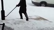 Guy falling for 9 seconds while trying to shovel snow