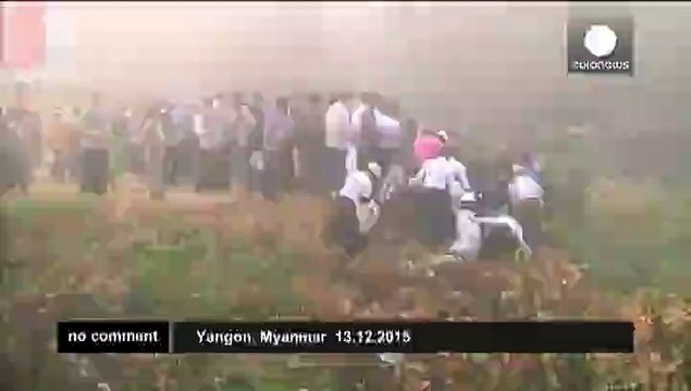 Aung San Suu Kyi leads a cleaning up operation