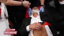 Triple H helped by paramedics after being attacked by Roman Reigns׃ WWE.com Exclusive, Dec. 13, 2015