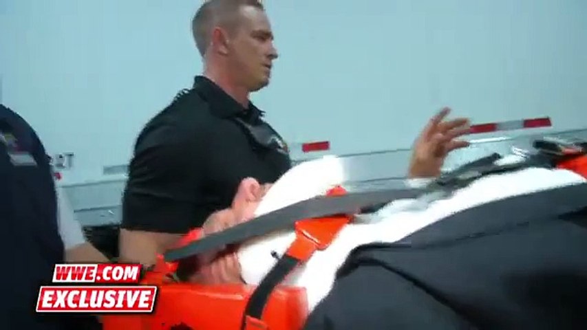 Triple H is loaded into an ambulance after being attacked by Roman Reigns׃ December 13, 2015