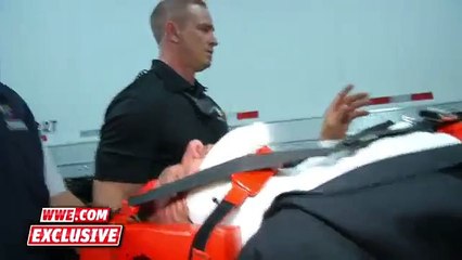 Triple H is loaded into an ambulance after being attacked by Roman Reigns׃ December 13, 2015