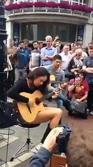 Amazing girl plays guitar on the streets