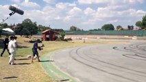 Cristiano Ronaldo shooting balls on the track with Jenson Button