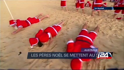 Les pères Noel se mettent au surf