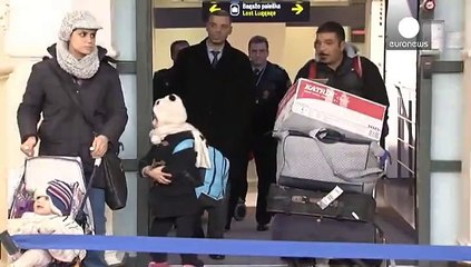 Lithuania welcomes its first refugees under EU relocation plan