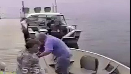 man falls from boat