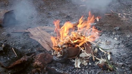 Make a Fire By Rubbing Sticks