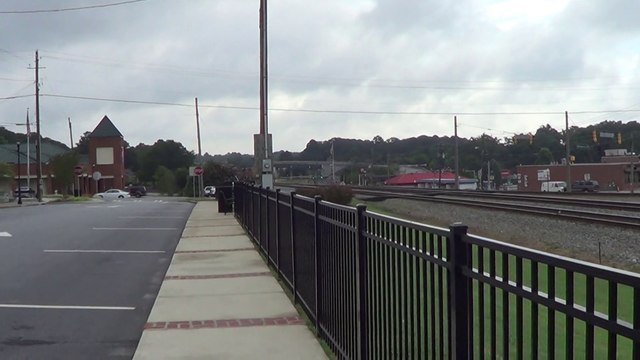 8-12-15 10:08 AM BNSF power leads NS 737 Coal Train NB through Austell Ga.