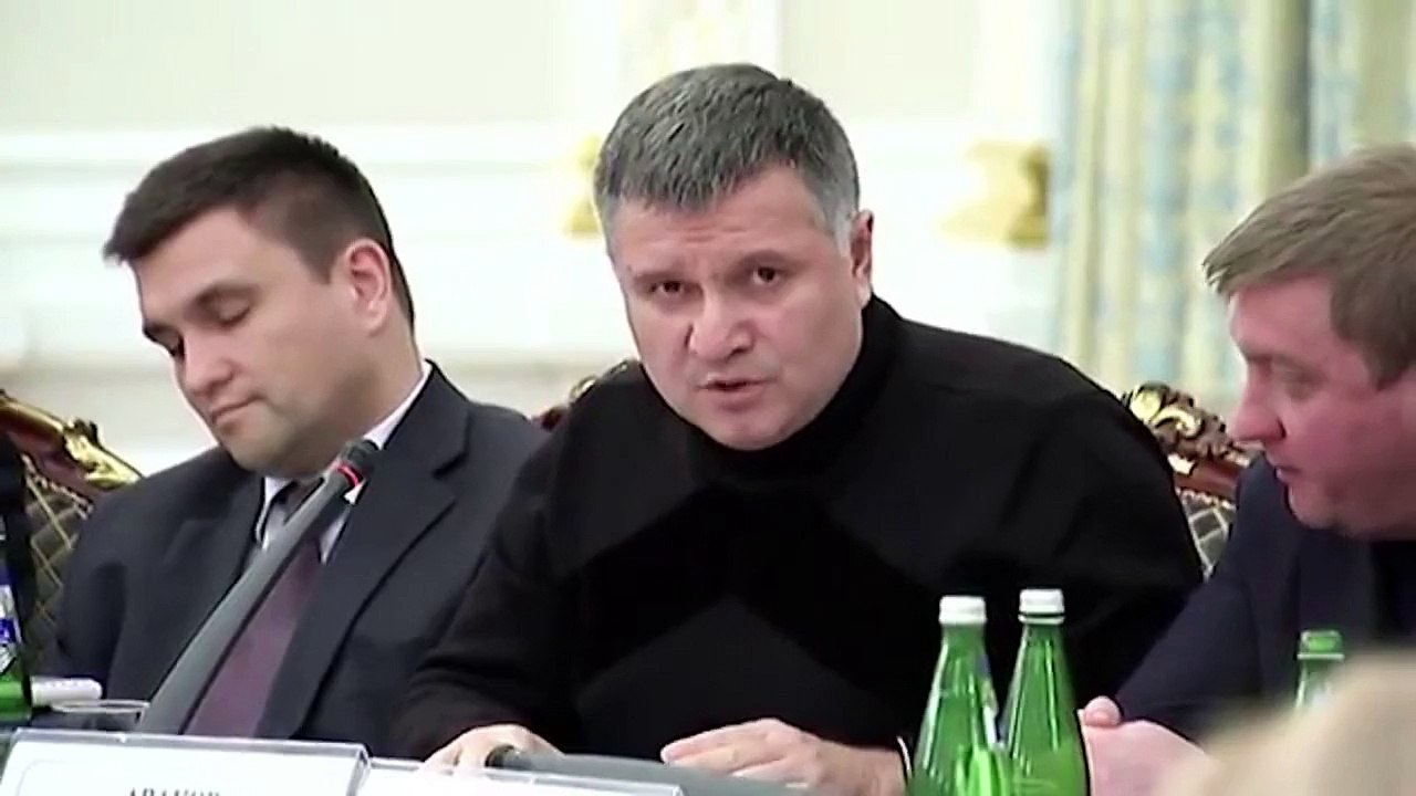 Ukraine minister throws water in governor's fac...
