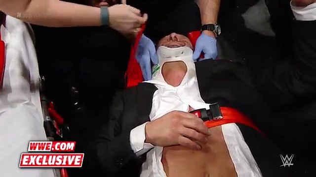 Triple H helped by paramedics after being attacked by Roman Reigns׃ WWE.com Exclusive, Dec. 13, 2015