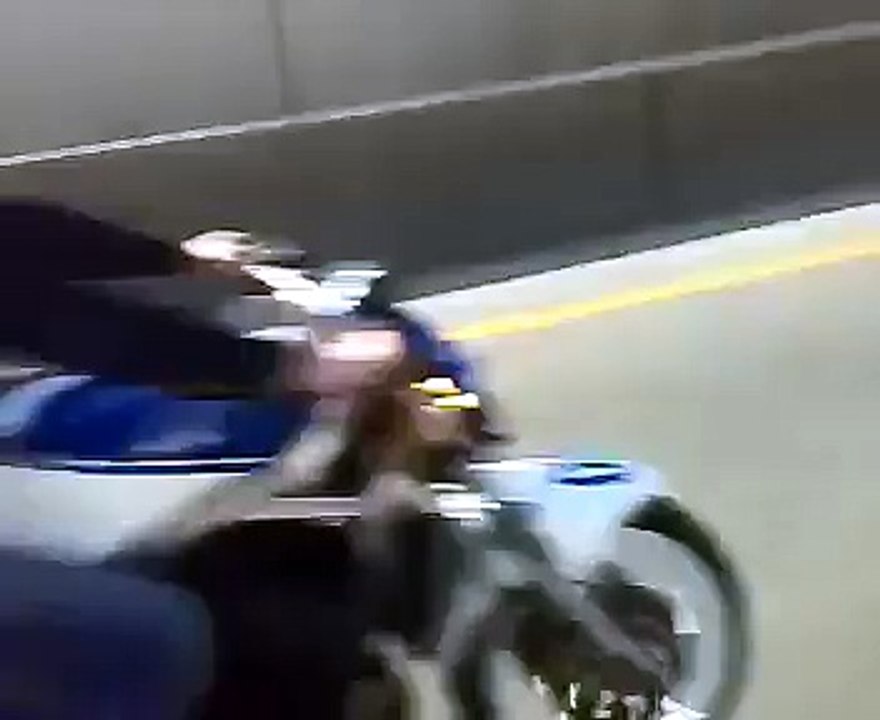 Women On Front MotorBike Wheeling