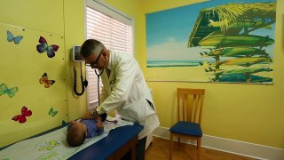 How To Calm A Crying Baby - Dr. Robert Hamilton Demonstrates _The Hold_ (Official)