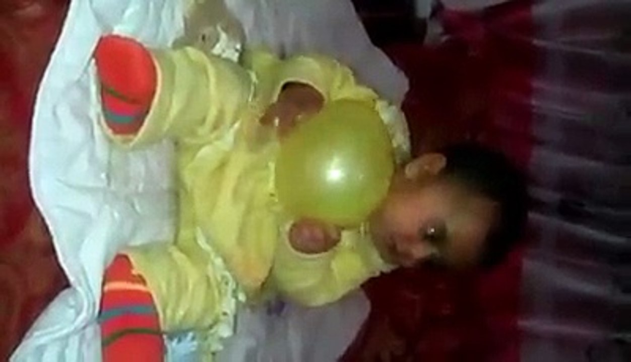 Baby Girl Playing With Baloon