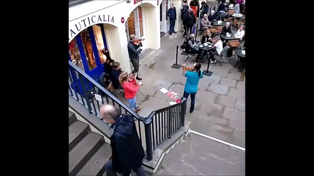 Crazy Woman dances during Classical Music Concert in Covent Garden Streets