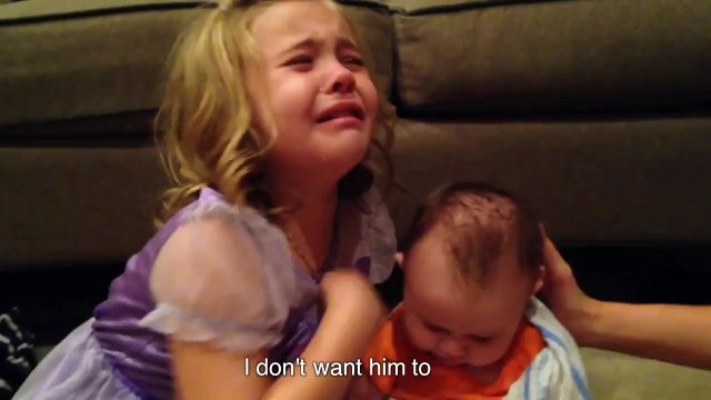Little girl sad her brother must grow up