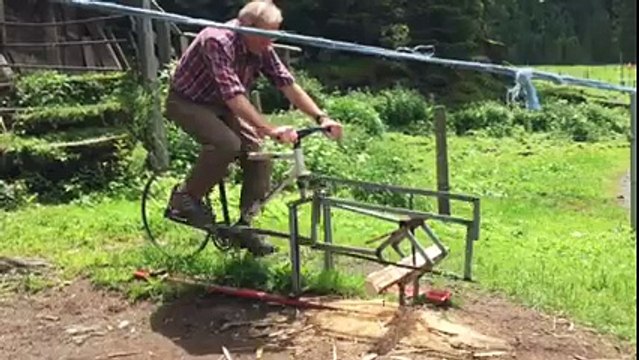 Guy build a Saw connected to a Bike to cut wood while cycling