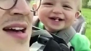 funny baby with father