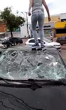 Betrayed woman destroys boyfriends car