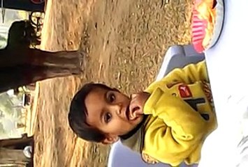 Little baby enjoying invitation in Garden