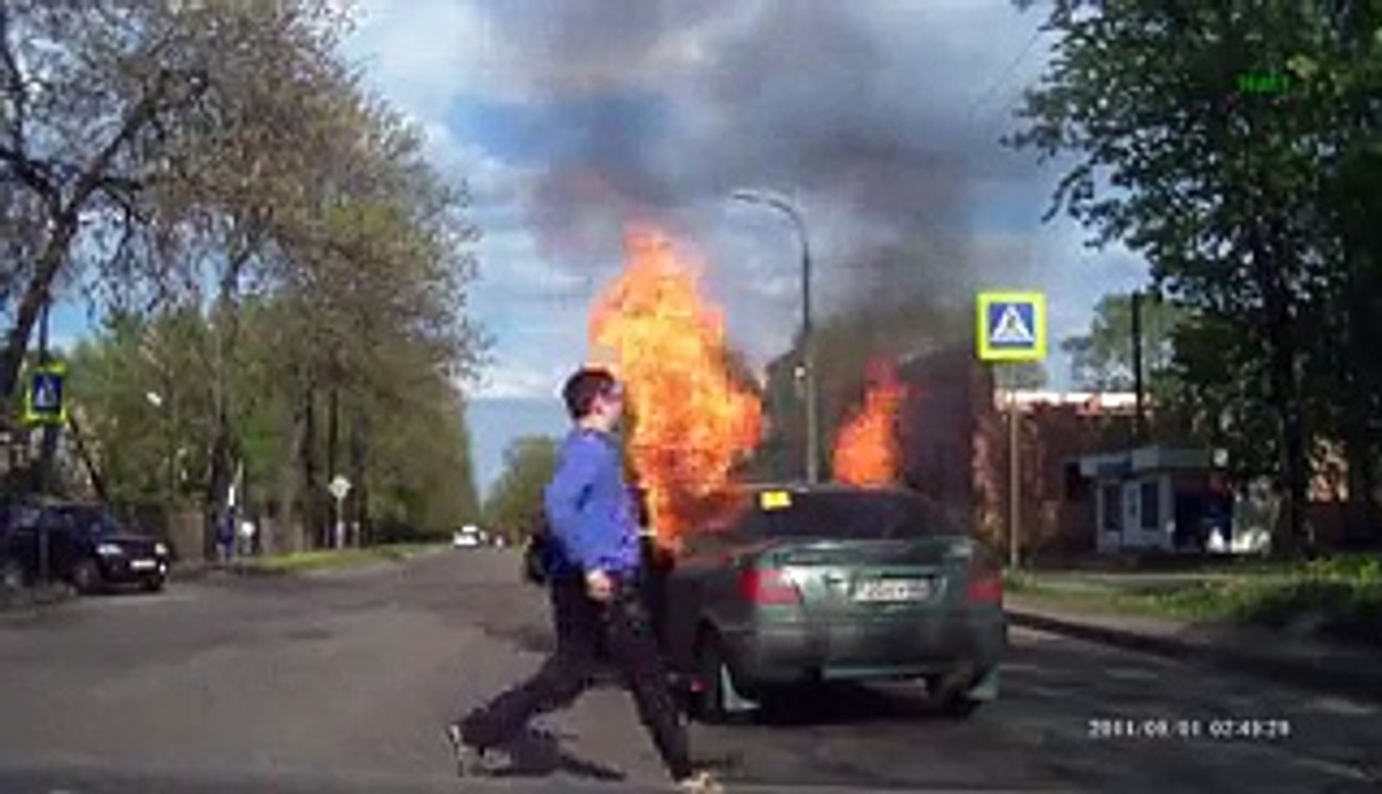 Woman smokes in the car with a gas cylinder
