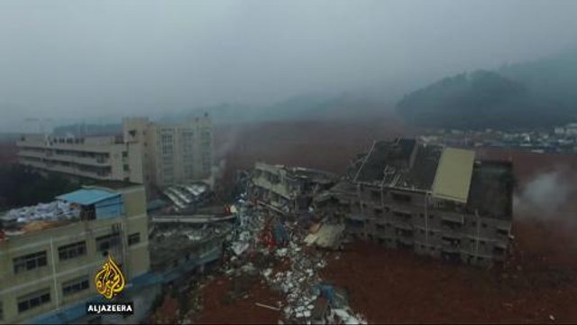 China continues to search for missing after landslide