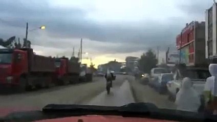 The best funny of 2016 A man riding a bicycle with a goat on his back