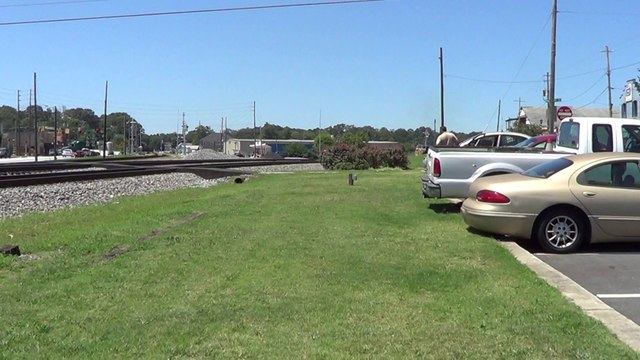 8-13-14 11:50 AM UP power leads NS 726 coal train SB through Austell Ga. with big lash up at rear.
