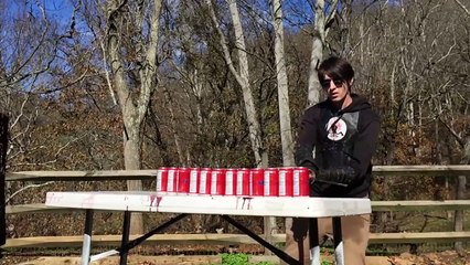 Katana Cut 10 Soda Cans in Half at Slow Motion