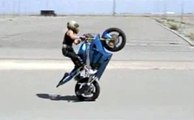 # Awesome - Hot Biker Chick Takes Tumble