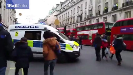 Shoppers evacuate Regent Street after black taxi scare