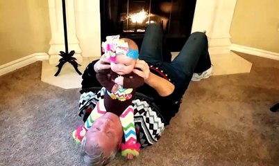 Baby who has a surprise for her grandpa