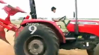 A Young Boy Drive Tractor Very Interesting