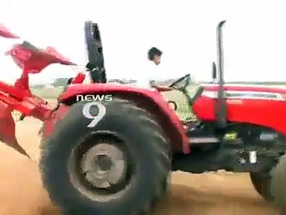 A Young Boy Drive Tractor Very Interesting