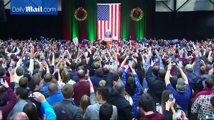 Trump praises Putin, bashes Merkel and Clinton in Michigan