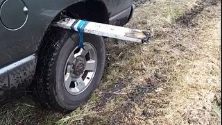 Watch this ingenious maneuver to get your car out of the mud!
