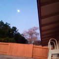 Moon looks like a distorted hologram.