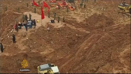 Man found alive three days after mud slide in China