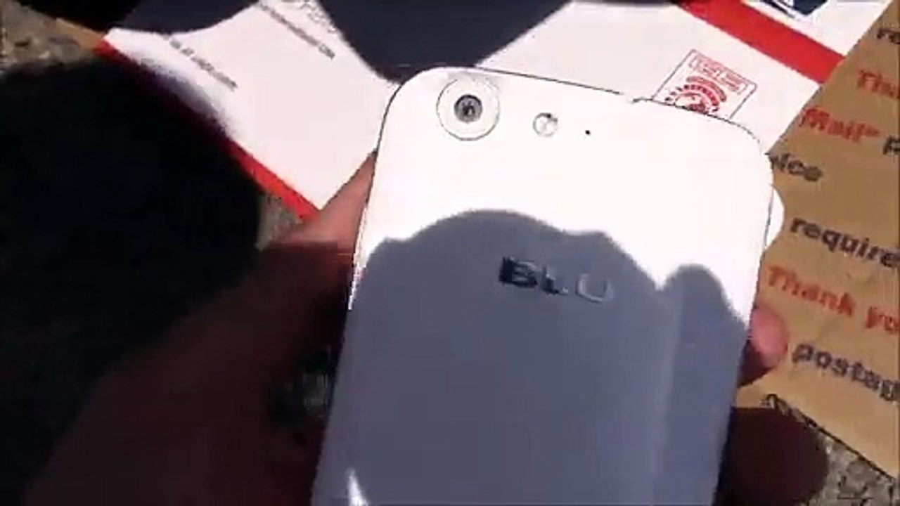 Driving over a blu android life one phone.