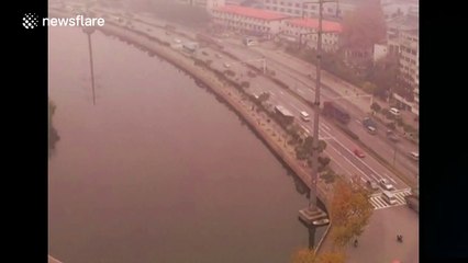 Red smog shrouds sky above Nanjing, China