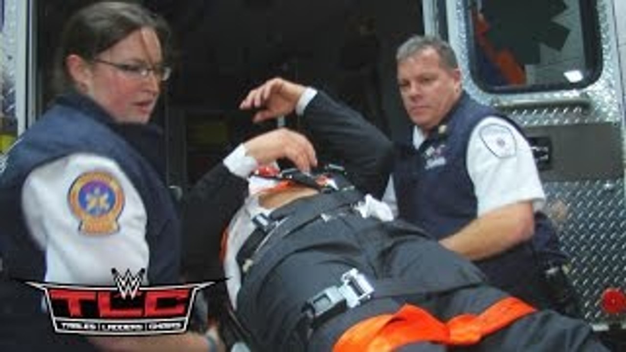 Triple H is loaded into an ambulance after being attacked by Roman Reigns: December 13, 20