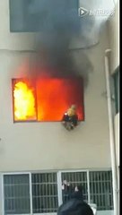 Chinese firefighter trapped in burning house