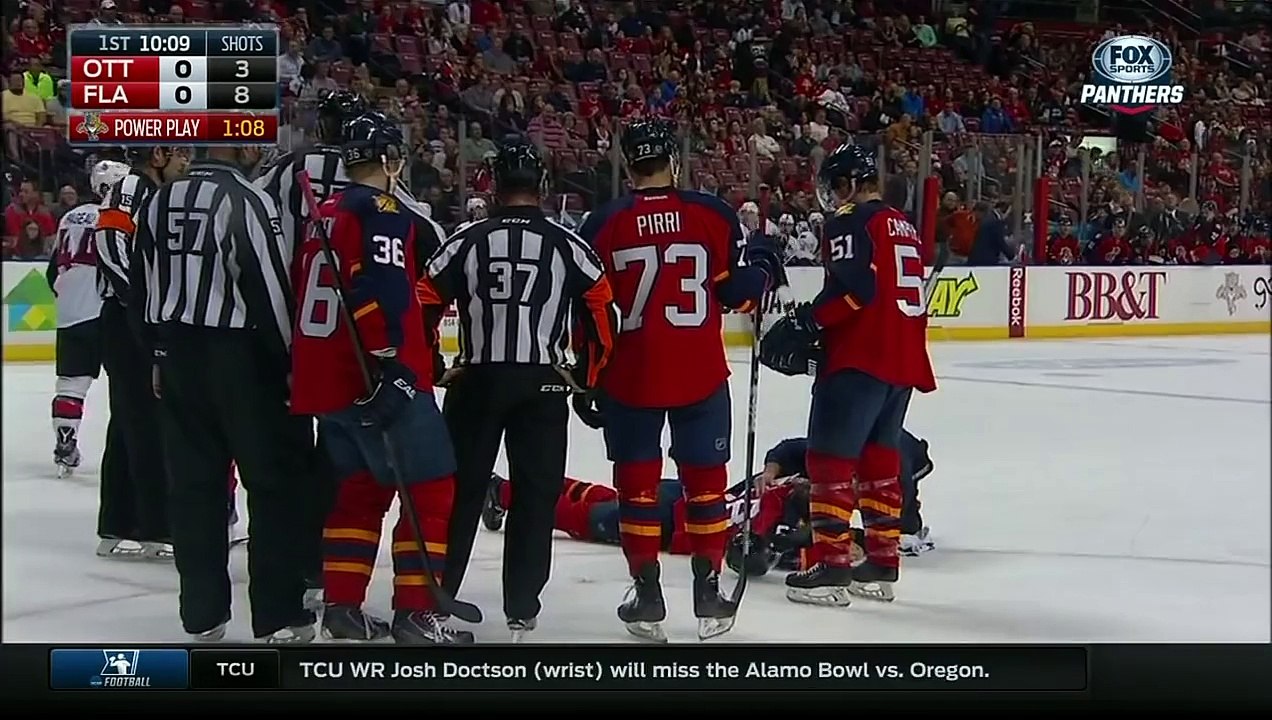 Hockey Player takes high Stick Kick and loses teeth on the Ice