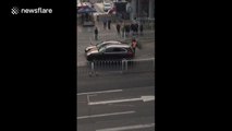 Porsche driver smashes car with pole in China road rage