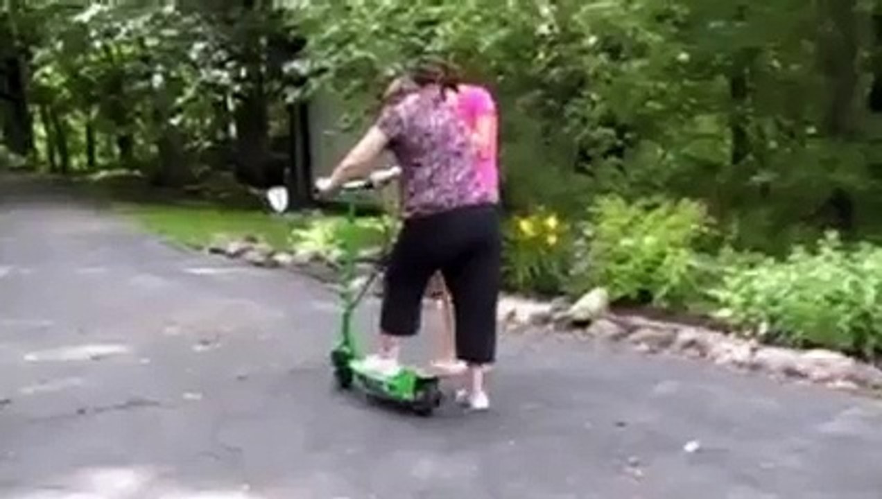 Mom Attempts to Ride Motorized Scooter
